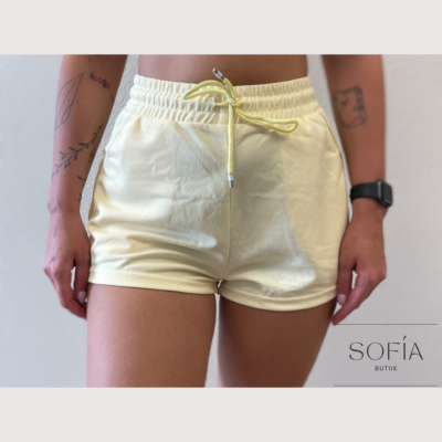 Naiste helekollased lühikesed püksid